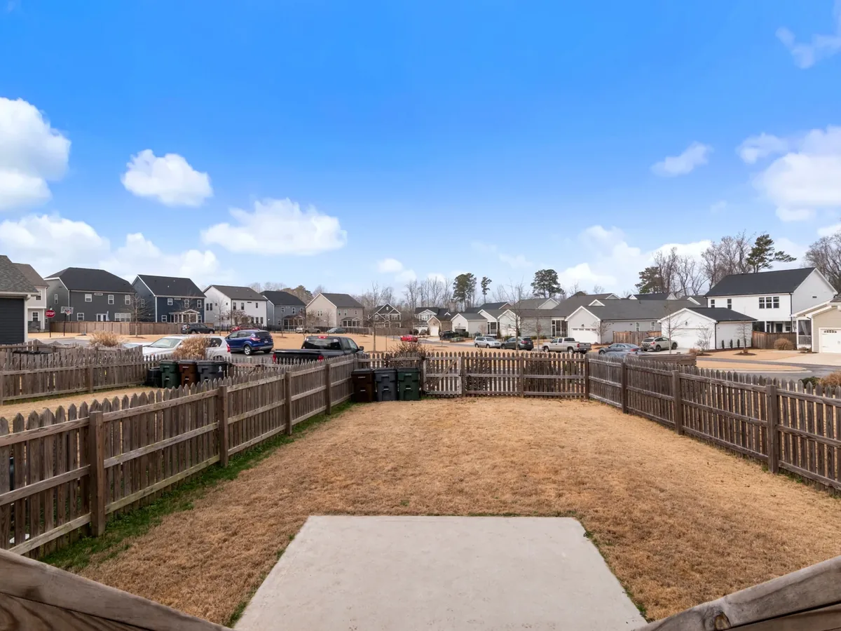 New wood fence around a suburban backyard